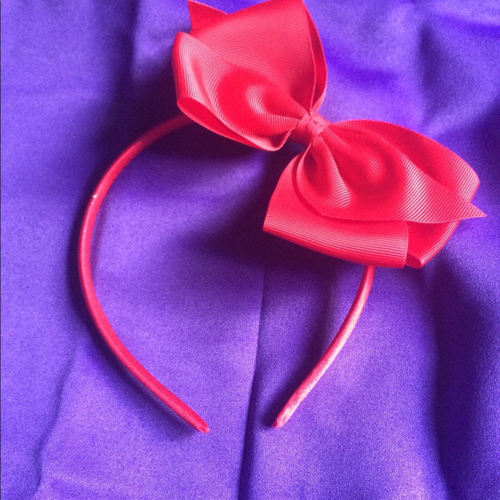 Christmas red hair band with adjustable bow.